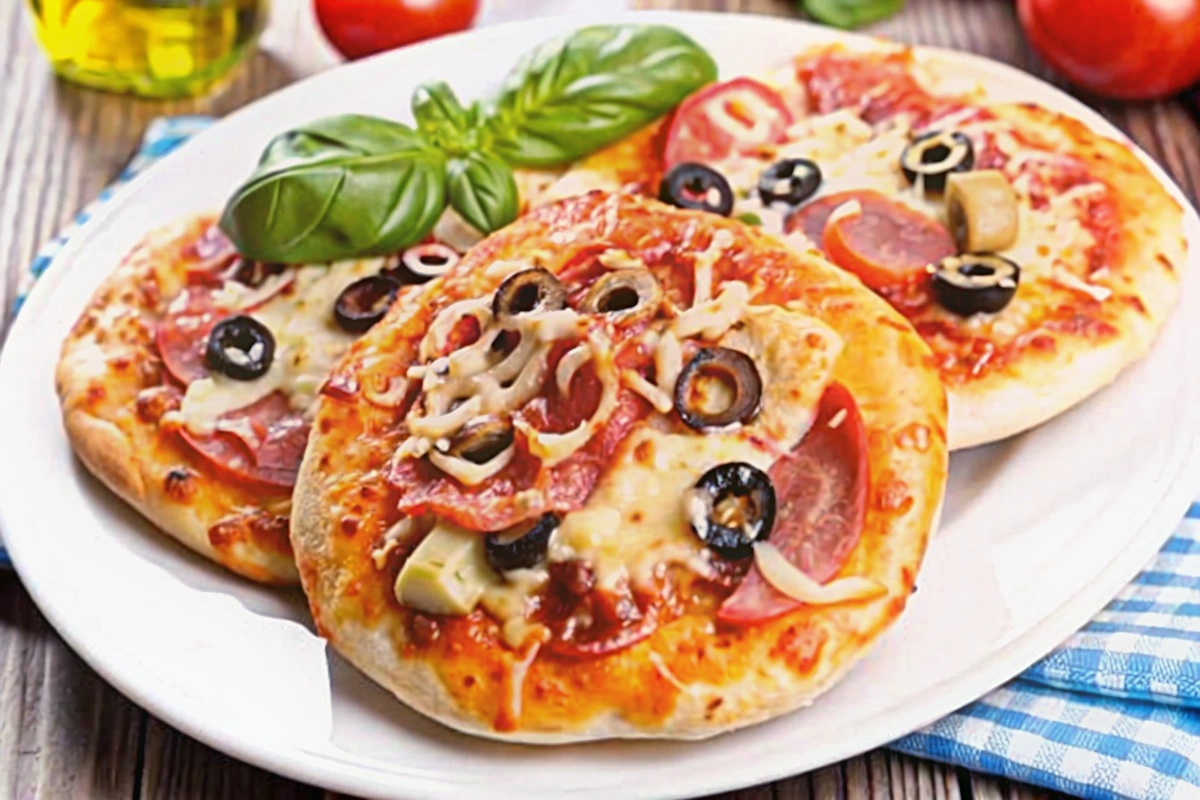 De délicieuses mini pizzas reine pour un apéritif
