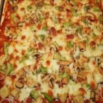 Pizza au poulet et poivrons